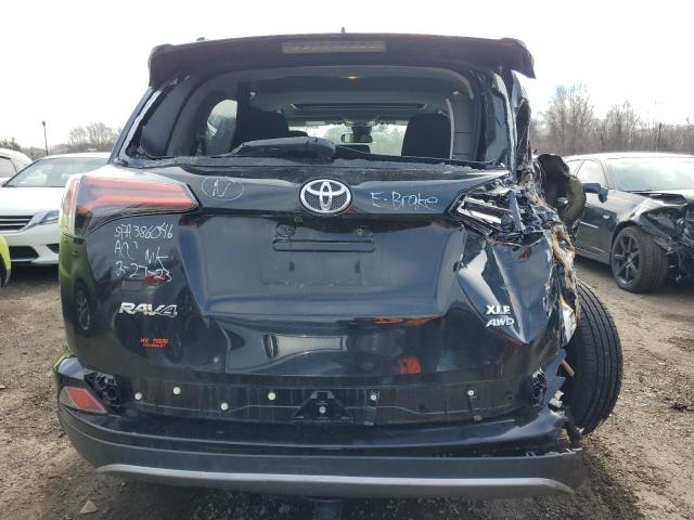 Photo 6 from auction – 2017 TOYOTA RAV4 XLE with VIN 2T3RFREV3HW680191