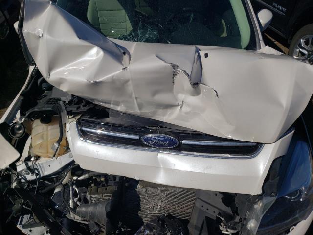 Photo 11 from auction – 2014 FORD ESCAPE TIT with VIN 1FMCU9J98EUB13404