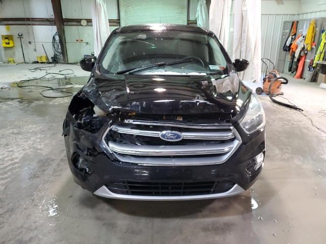 Photo 5 from auction – 2017 FORD ESCAPE SE with VIN 1FMCU9G96HUD29683