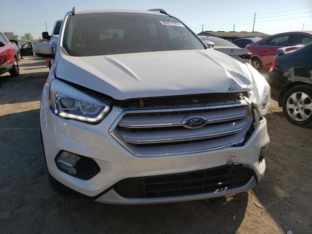 Photo 5 from auction – 2017 FORD ESCAPE TIT with VIN 1FMCU0J90HUE91216