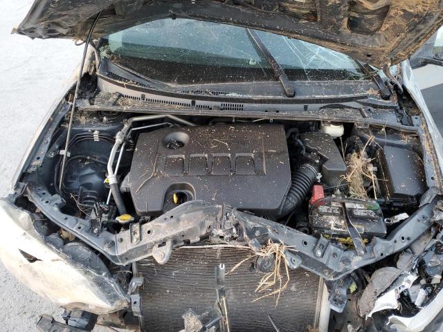 Photo 11 from auction – 2014 TOYOTA COROLLA L with VIN 2T1BURHE6EC074246