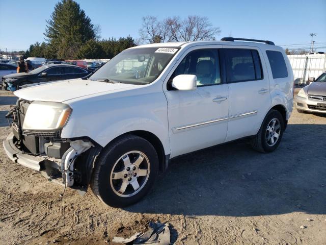 HONDA PILOT TOUR 2010 with VIN 5FNYF4H97AB013536 - Photo from auction