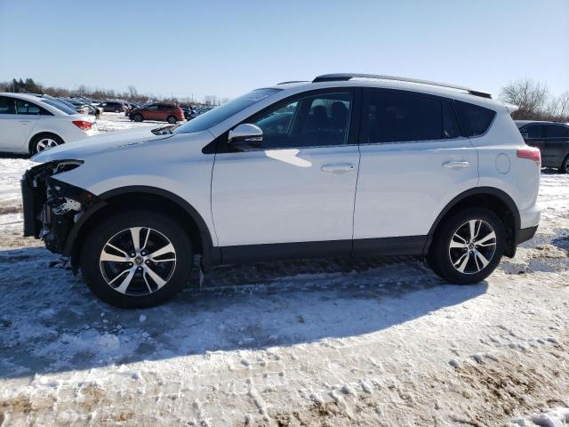 TOYOTA RAV4 LE 2018 with VIN 2T3ZFREV8JW497472 - Photo from auction