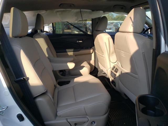 Photo 11 from auction – 2022 HONDA PILOT TOUR with VIN 5FNYF5H66NB004540