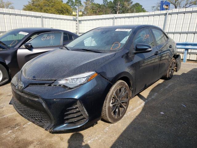 TOYOTA COROLLA L 2018 with VIN 5YFBURHE4JP774695 - Photo from auction