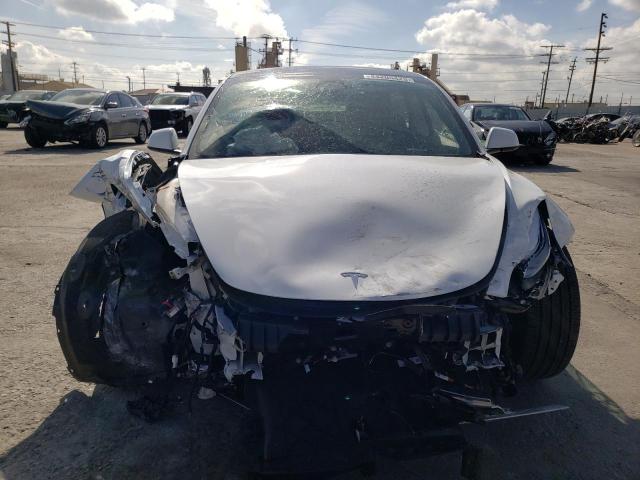 Photo 5 from auction – 2022 TESLA MODEL 3 with VIN 5YJ3E1EB3NF321179
