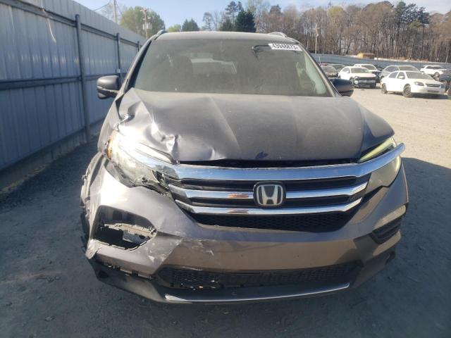 Photo 5 from auction – 2016 HONDA PILOT TOUR with VIN 5FNYF5H94GB016943