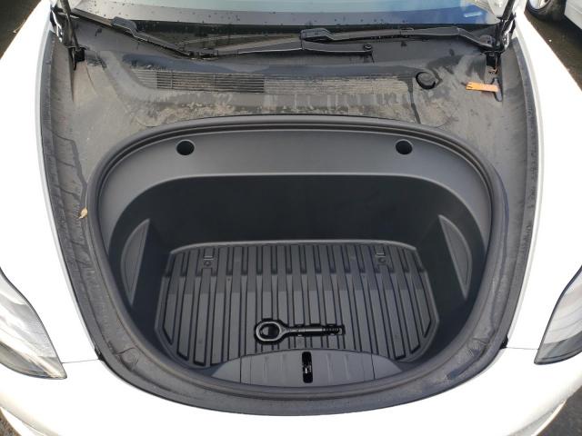 Photo 11 from auction – 2021 TESLA MODEL 3 with VIN 5YJ3E1EA0MF873874