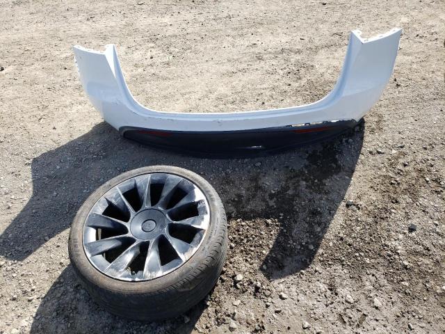 Photo 12 from auction – 2021 TESLA MODEL Y with VIN 5YJYGDED7MF115008