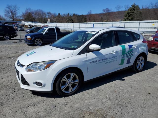 FORD FOCUS SE 2014 with VIN 1FADP3K2XEL102561 - Photo from auction