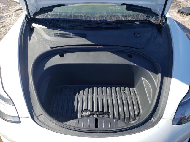 Photo 11 from auction – 2021 TESLA MODEL 3 with VIN 5YJ3E1EB7MF974354