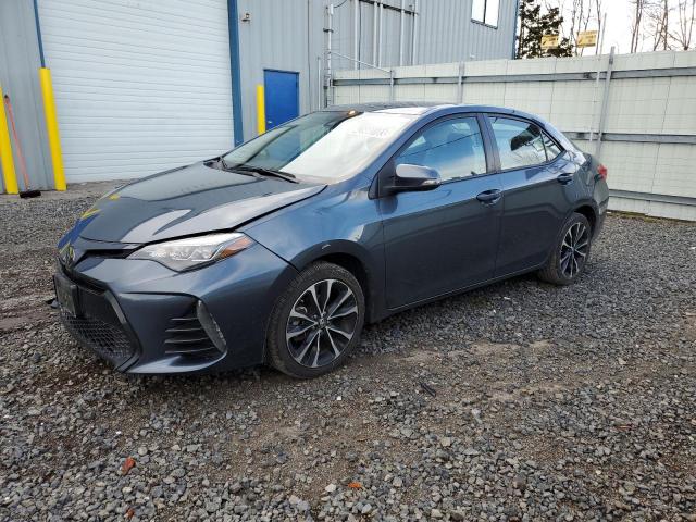 TOYOTA COROLLA L 2019 with VIN 2T1BURHE3KC209971 - Photo from auction