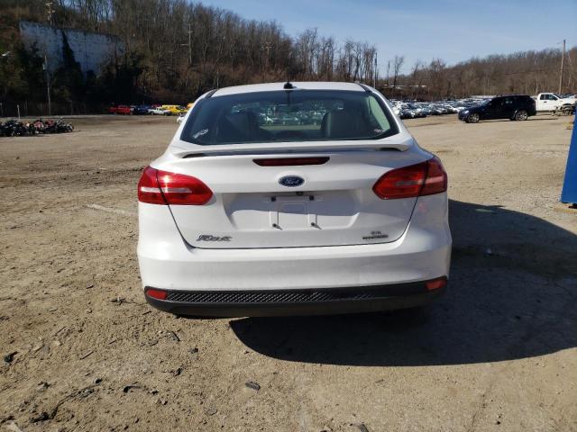 Photo 6 from auction – 2015 FORD FOCUS SE with VIN 1FADP3F24FL289890