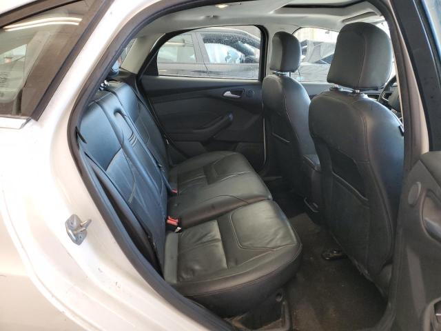 Photo 10 from auction – 2015 FORD FOCUS TITA with VIN 1FADP3J25FL379329