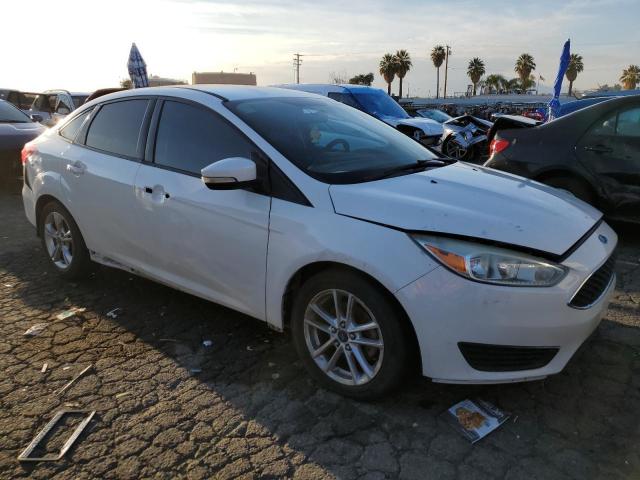 Photo 4 from auction – 2015 FORD FOCUS SE with VIN 1FADP3F21FL295940