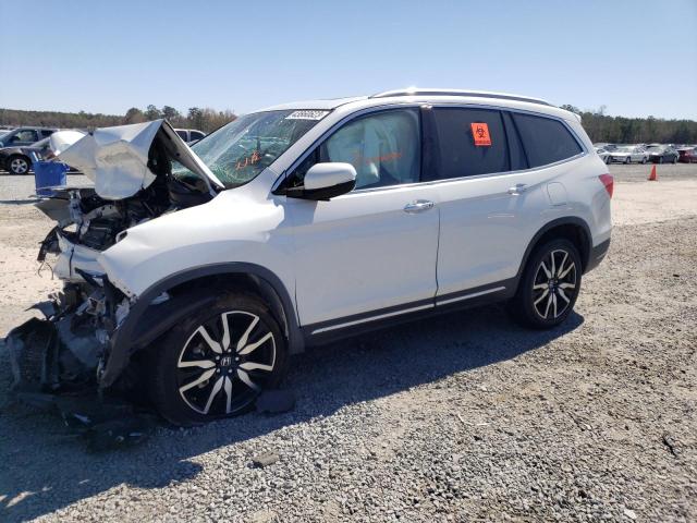 HONDA PILOT TOUR 2020 with VIN 5FNYF5H60LB011206 - Photo from auction