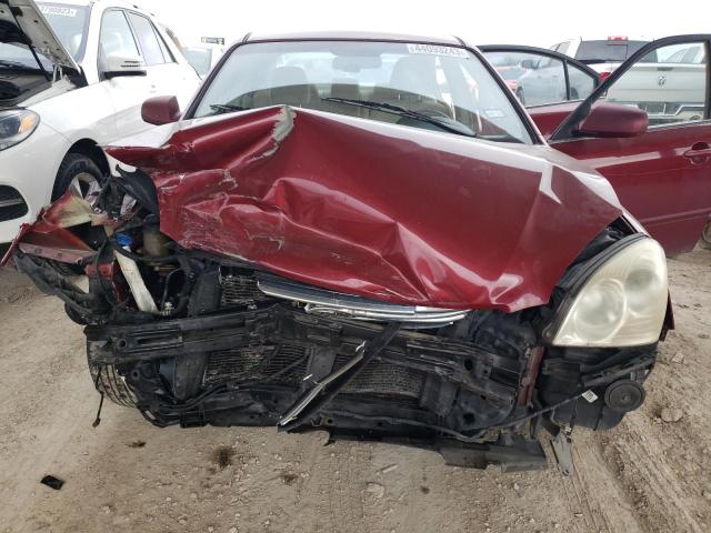 Photo 11 from auction – 2007 KIA OPTIMA LX with VIN KNAGE123075114913