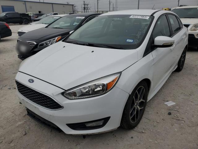 FORD FOCUS SE 2016 with VIN 1FADP3F25GL394987 - Photo from auction