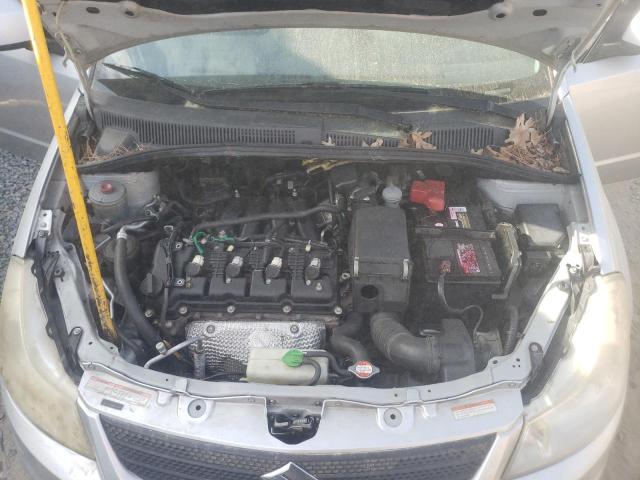 Photo 11 from auction – 2013 SUZUKI SX4 LE with VIN JS2YC5A31D6100309