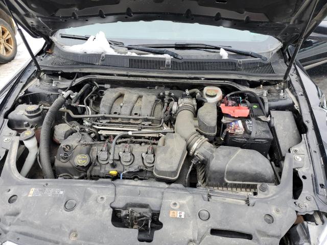 Photo 11 from auction – 2015 FORD TAURUS SEL with VIN 1FAHP2H81FG193527