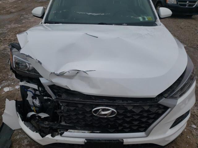Photo 11 from auction – 2020 HYUNDAI TUCSON SE with VIN KM8J2CA45LU243409