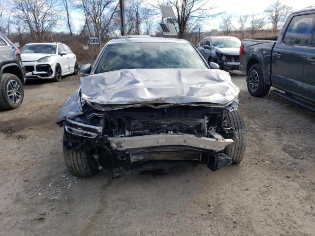Photo 5 from auction – 2022 GENESIS G70 BASE with VIN KMTG54TE0NU093747