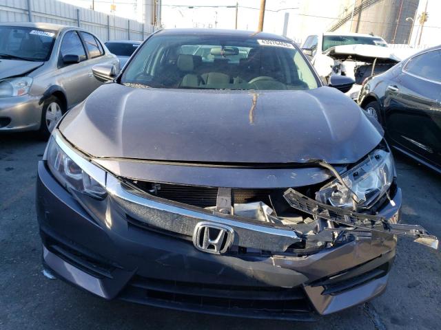 Photo 5 from auction – 2017 HONDA CIVIC LX with VIN 2HGFC2F57HH518311