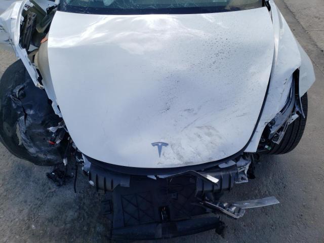 Photo 11 from auction – 2022 TESLA MODEL 3 with VIN 5YJ3E1EB3NF321179