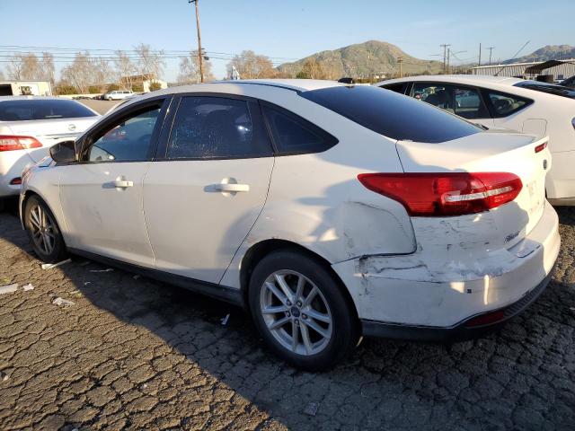 Photo 2 from auction – 2015 FORD FOCUS SE with VIN 1FADP3F21FL295940