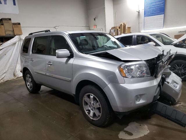 Photo 4 from auction – 2010 HONDA PILOT TOUR with VIN 5FNYF4H96AB033910