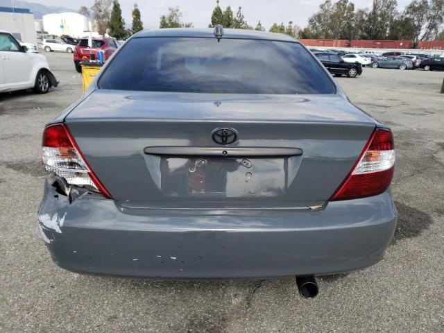 Photo 6 from auction – 2002 TOYOTA CAMRY LE with VIN JTDBE32K820062713