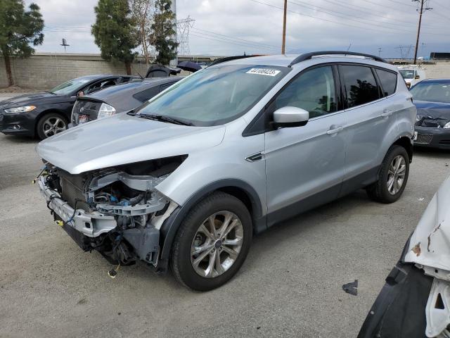 Photo 1 from auction – 2018 FORD ESCAPE SE with VIN 1FMCU0GD0JUD06485