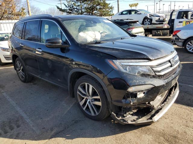 Photo 4 from auction – 2018 HONDA PILOT ELIT with VIN 5FNYF6H05JB033913