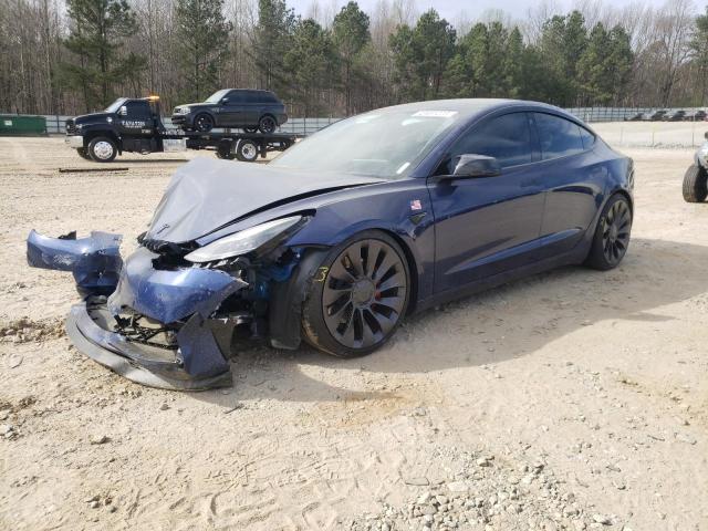 TESLA MODEL 3 2022 with VIN 5YJ3E1EC3NF165735 - Photo from auction
