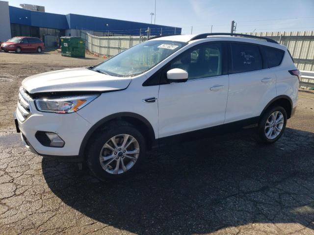 FORD ESCAPE SE 2018 with VIN 1FMCU9GD9JUC43665 - Photo from auction