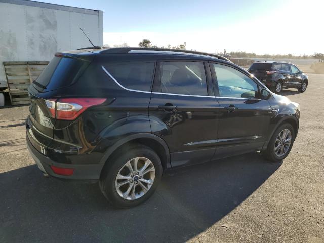 Photo 3 from auction – 2017 FORD ESCAPE SE with VIN 1FMCU9GD6HUB55540