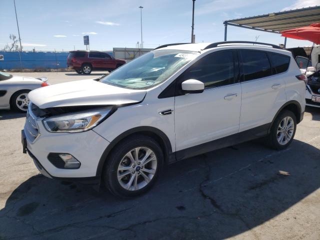 FORD ESCAPE SE 2018 with VIN 1FMCU9GD3JUD43535 - Photo from auction