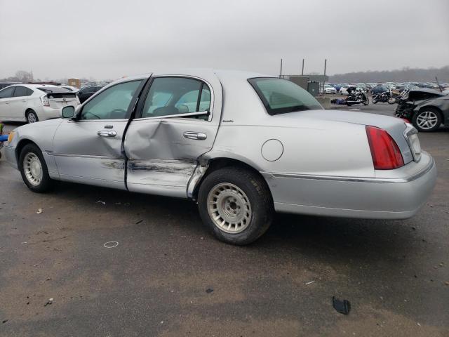Photo 2 from auction – 2002 LINCOLN TOWN CAR E with VIN 1LNHM81W72Y611457