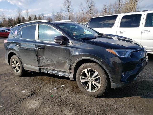 Photo 4 from auction – 2016 TOYOTA RAV4 XLE with VIN 2T3RFREV6GW476967