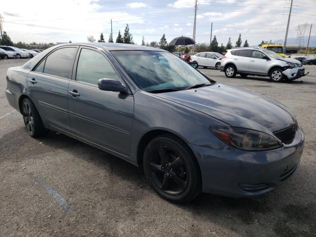 Photo 4 from auction – 2002 TOYOTA CAMRY LE with VIN JTDBE32K820062713
