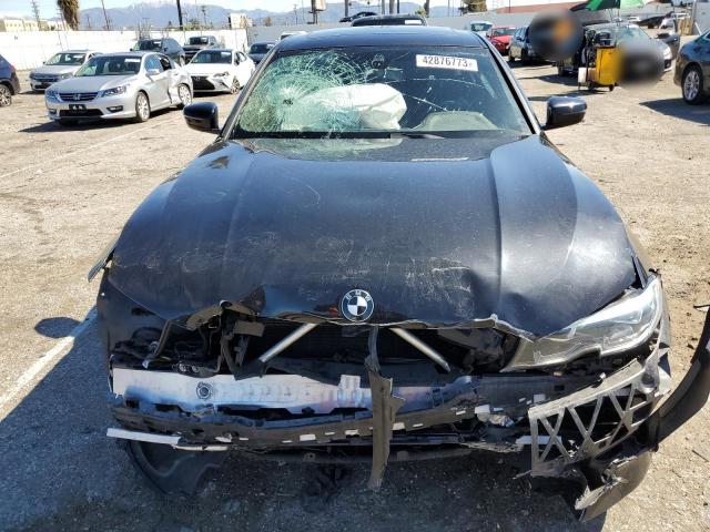 Photo 5 from auction – 2021 BMW 330I with VIN 3MW5R1J00M8C14902