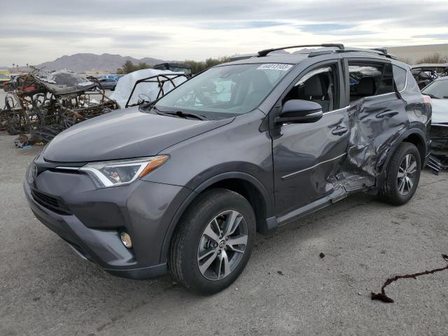 TOYOTA RAV4 XLE 2017 with VIN 2T3WFREV8HW390421 - Photo from auction