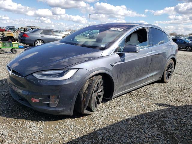 TESLA MODEL X 2017 with VIN 5YJXCBE2XHF037887 - Photo from auction
