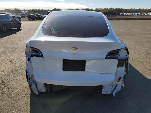 Photo 6 from auction – 2021 TESLA MODEL Y with VIN 5YJYGDEE0MF106076