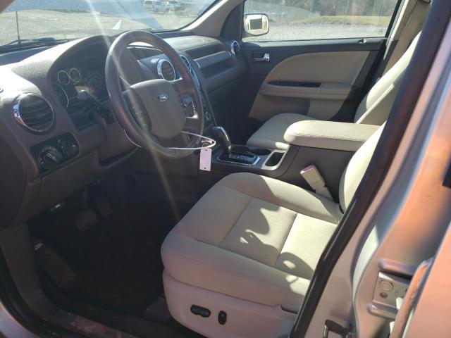 Photo 7 from auction – 2008 FORD TAURUS X S with VIN 1FMDK02W18GA13383