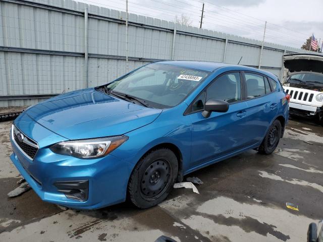 SUBARU IMPREZA 2019 with VIN 4S3GTAA64K3702578 - Photo from auction
