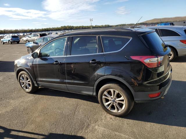 Photo 2 from auction – 2017 FORD ESCAPE SE with VIN 1FMCU9GD6HUB55540