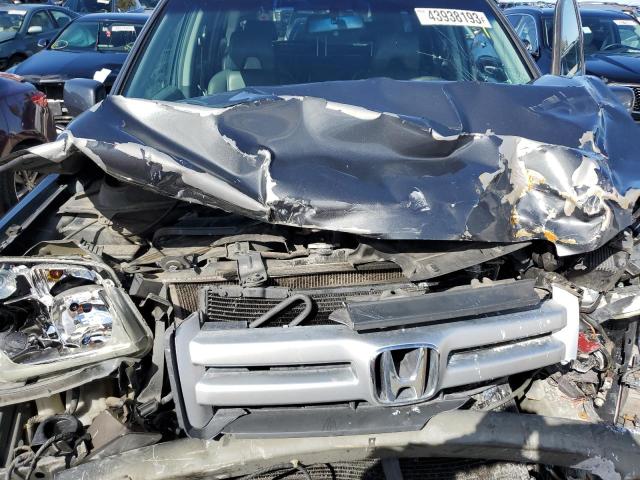Photo 12 from auction – 2006 HONDA PILOT EX with VIN 2HKYF18786H536974