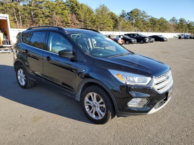 Photo 4 from auction – 2017 FORD ESCAPE SE with VIN 1FMCU9GD4HUF00631