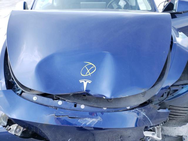 Photo 12 from auction – 2022 TESLA MODEL Y with VIN 7SAYGDEEXNF330511